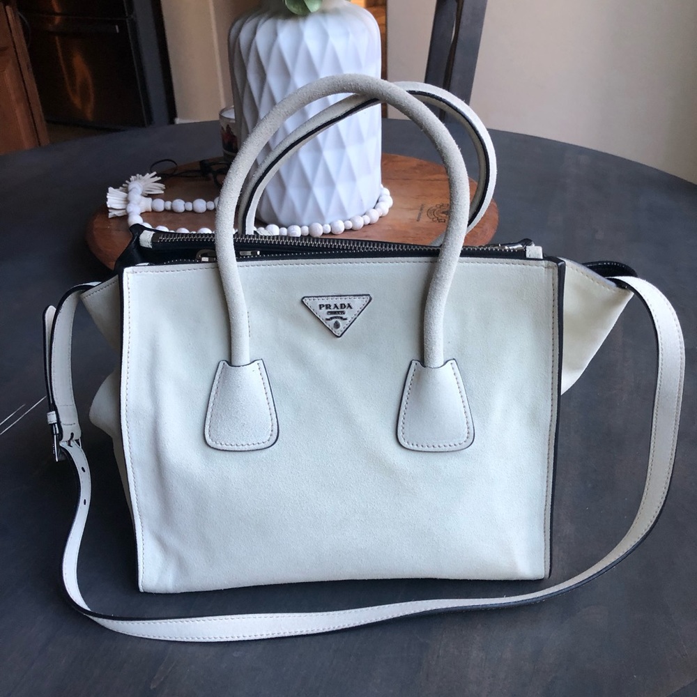 White Suede Prada purse.
